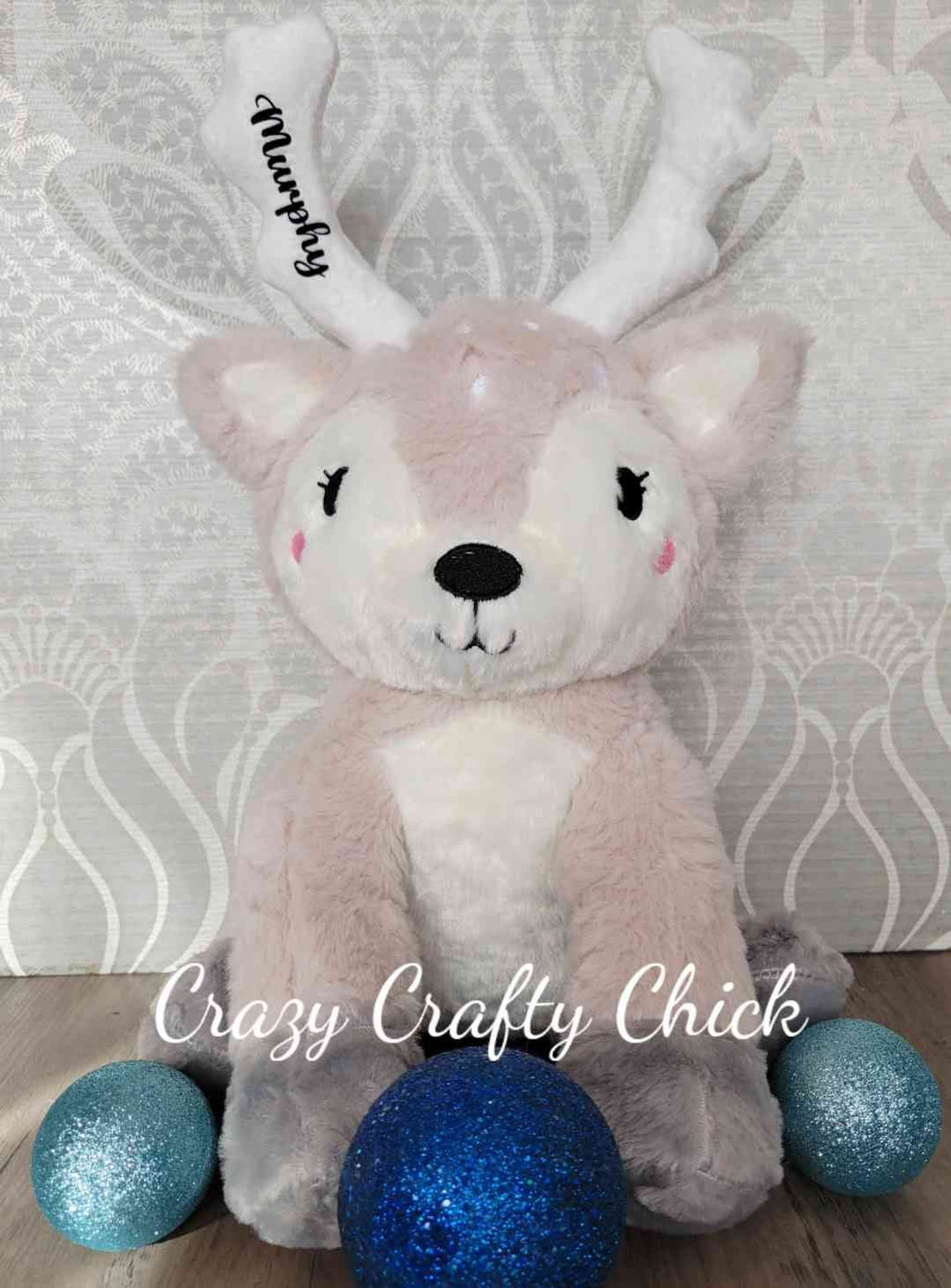 Personalized plush reindeer with name on antlers