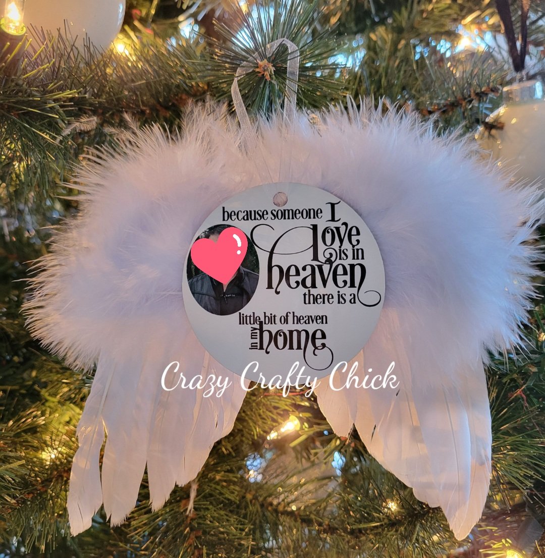 Angel wing memorial ornament on Christmas tree