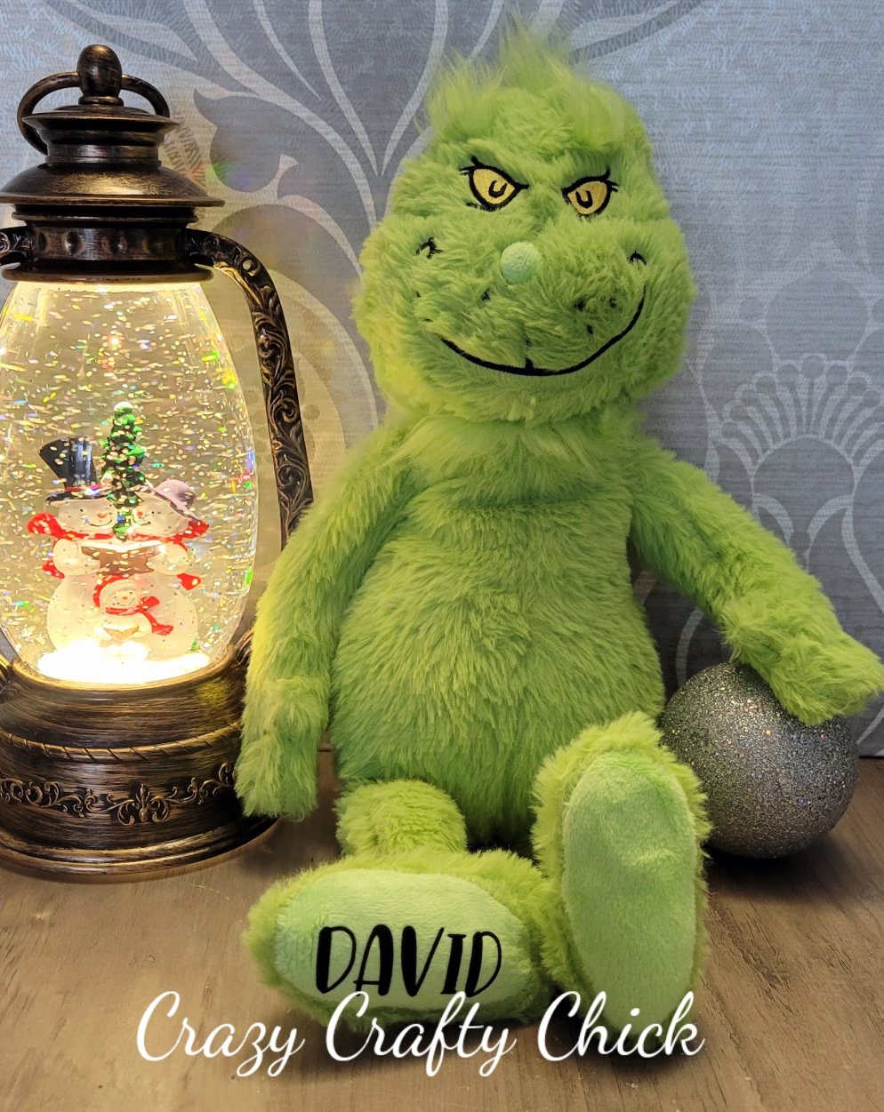 Personalized Grinch plush with name on foot
