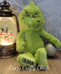 Personalized Grinch plush with name on foot