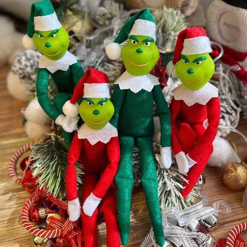 Grinch dolls in green and red outfits