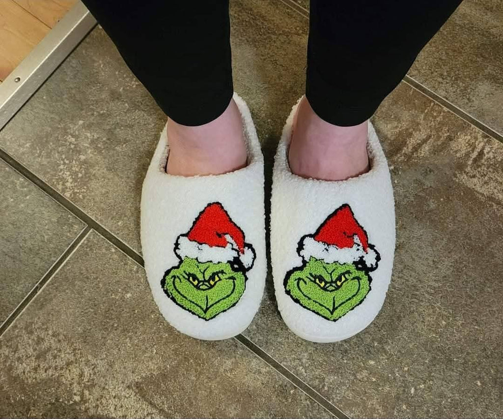 Grinch slippers worn