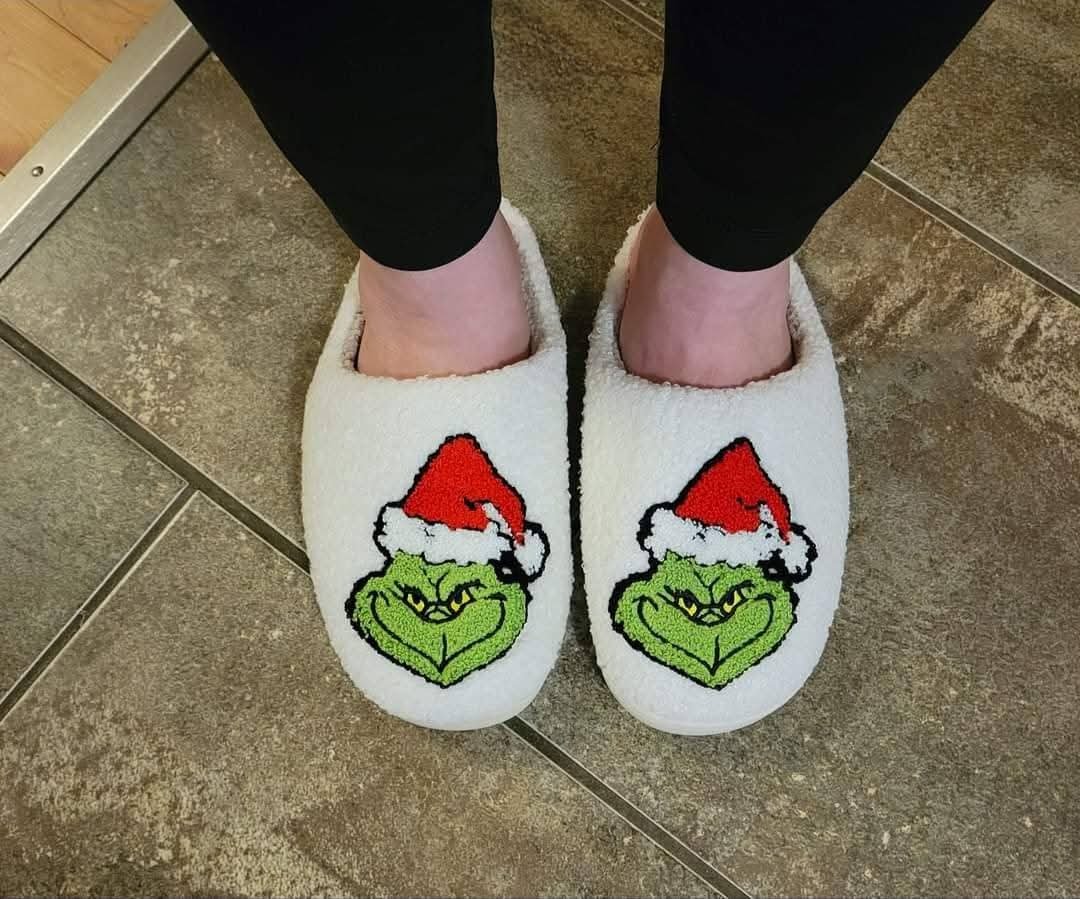 Grinch slippers worn