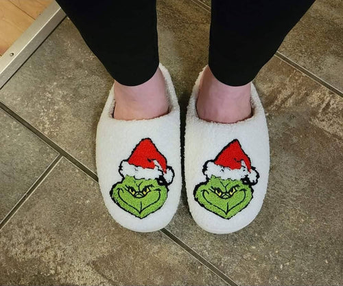 Grinch slippers worn